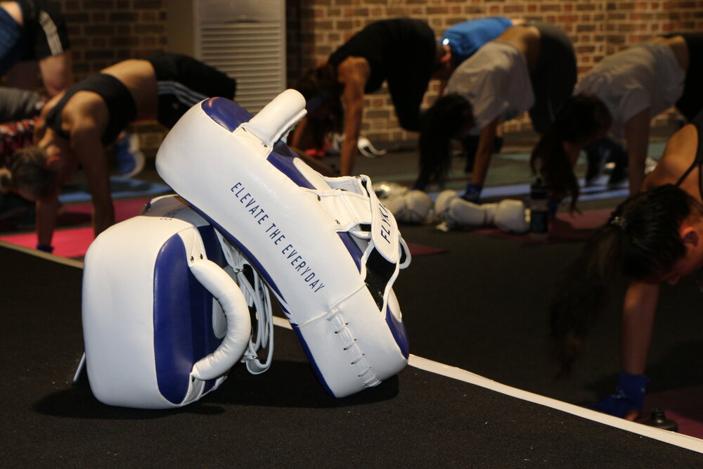 POP-UP CLASSES + WELLNESS EVENTS - We can run our Signature classes at your office or private venue for special events, wellbeing weeks and simply the days when your team is too busy to make it to the studio. We can also run workshops on topics such as nutrition, mental wellbeing, weight-training and more;Book a FLYKICK instructor to teach a HIIT and Padwork Pop-Up class for up to 30 guests - we’ll kit you all out with our rental gloves and wraps